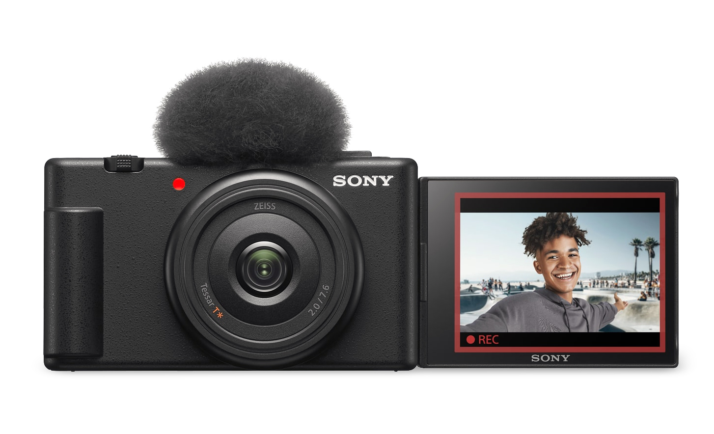 Slika fotoaparata ZV-1F z nameščeno zaščito pred vetrom in odprtim zaslonom