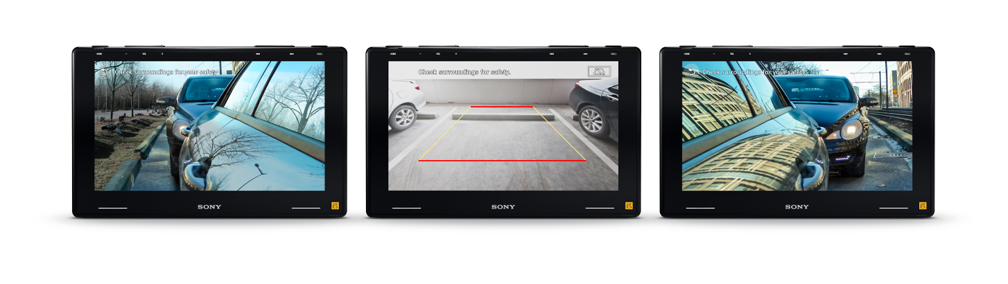 Slika 3 enot XAV-9550ES, ki prikazuje poglede kamere pomočnika za parkiranje z leve, desne in vzvratne kamere.